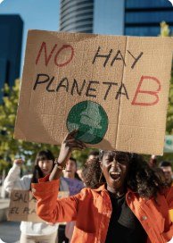 气候游行中，一位年轻女子举着写有“No hay planeta B”的纸板标语